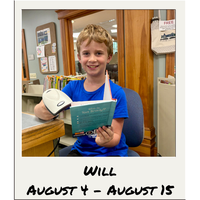 Nesmith Library's 2025 Kid Librarian: Will, featuring a picture of Will scanning a book at the circulation desk.