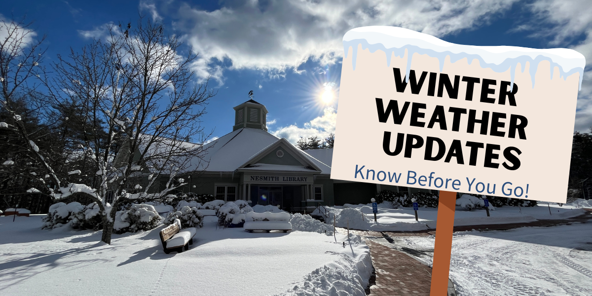 Snowy library exterior with winter weather closure information sign